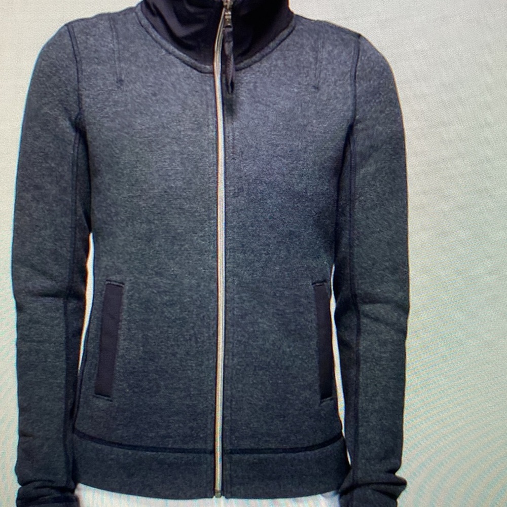 Lululemon gray jacket with unique back zipper.